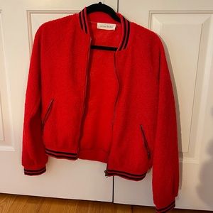 Caren Forbes red cozy bomber jacket